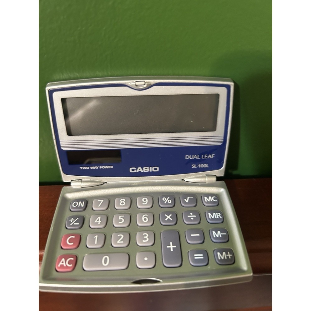 Casio SL-100L Dual Leaf Folding Pocket Calculator Solar Battery Silver Blue